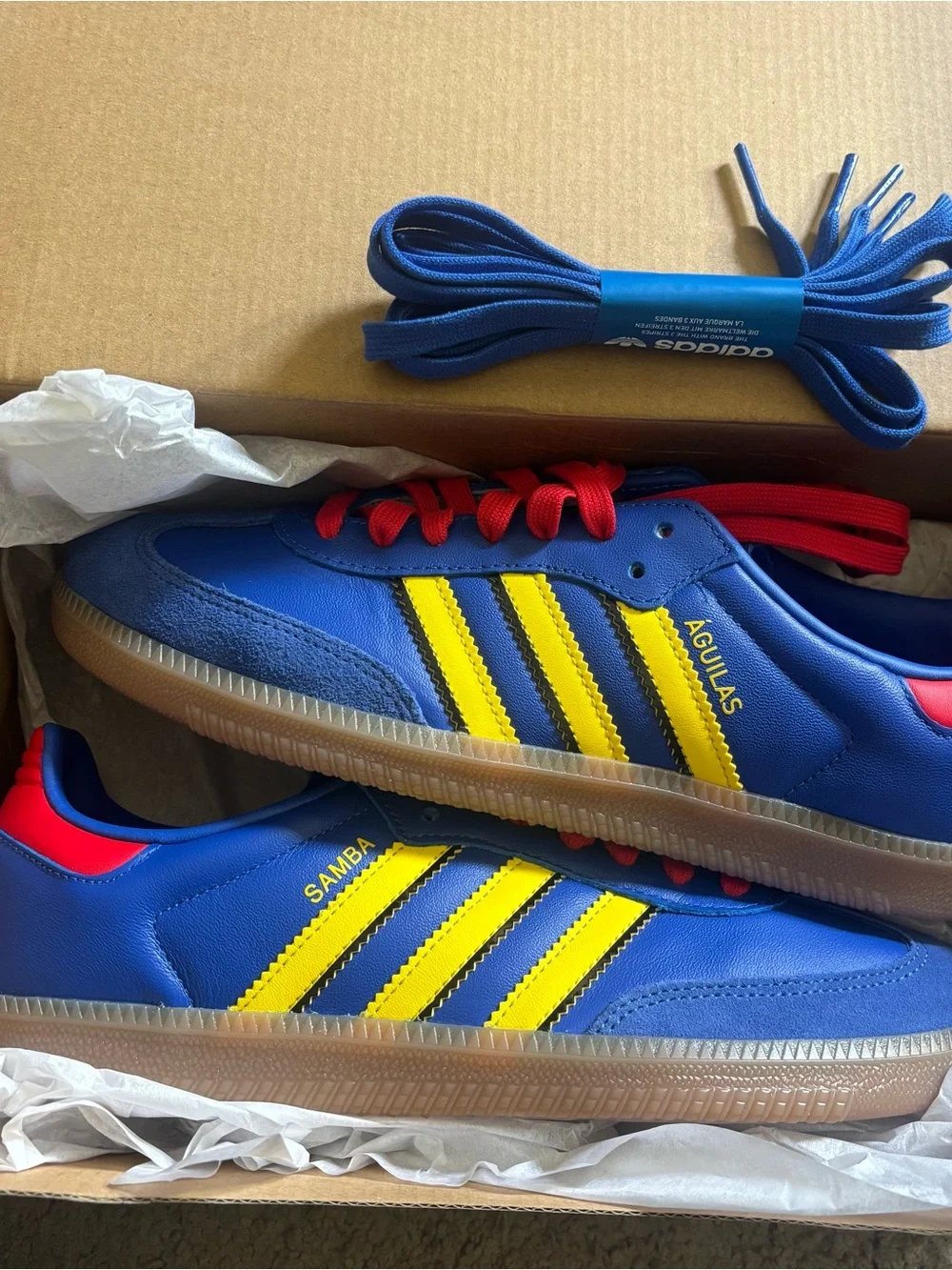 adidas Samba Azul Blue Shoes with Yellow Stripes and Red Accents
